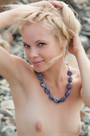 Blonde hot teen Feeona A posing on beach showing tiny titties  shaved pussy