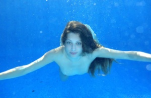 Bashful young sunbather Talia Mint doffs bikini to finger poolside  swim nude