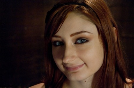Natural redhead is tortured in a dungeon by a female before being fucked