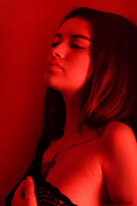 Sweet teen Liron Shein touches her tight slit after getting completely naked