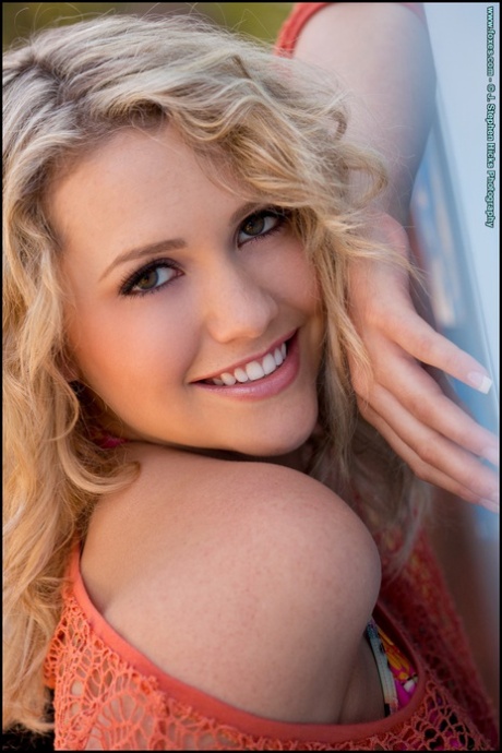 Beautiful blonde Mia Malkova goes topless on a sofa while in a backyard 92642447