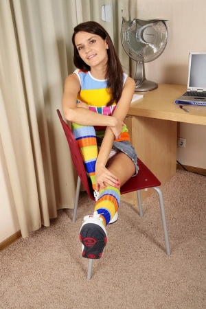 Solo girl Dasha gets naked in multi-colored knee socks and sneakers