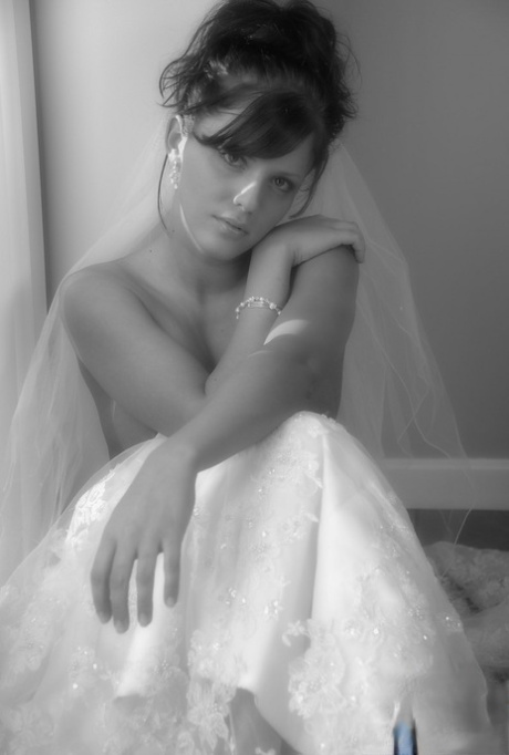 Amateur model Karen poses in wedding dress during solo action