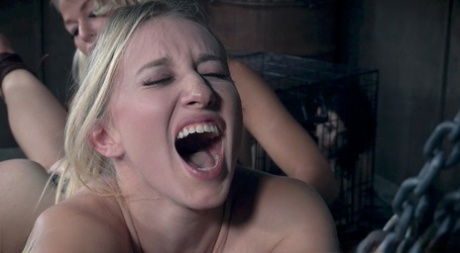 Hot blonde slave bound  gagged on table for pussy torture in rough lezdom