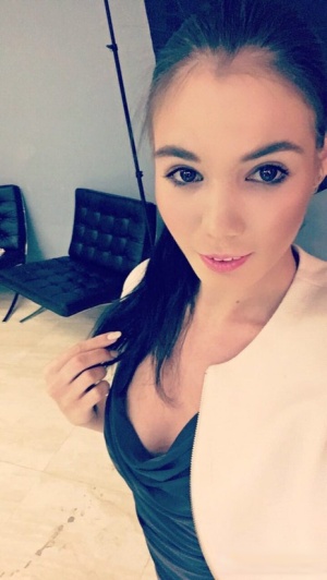 Amateur model Lovenia Lux takes clothed and topless selfies