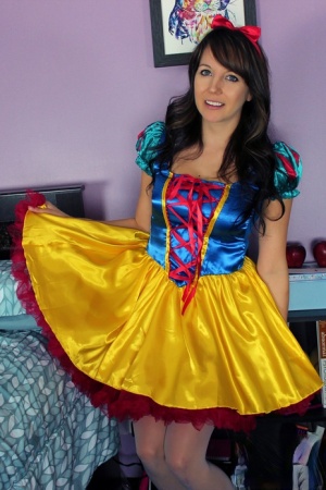 Brunette amateur Andi Land exposes herself while wearing a Snow White outfit