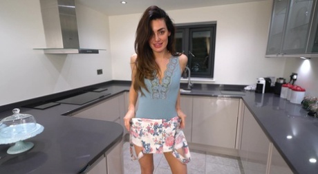 British amateur displays her nice ass after getting naked in a kitchen