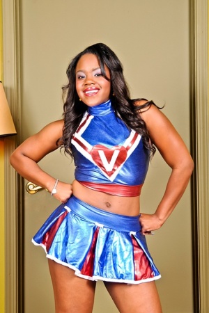 Ebony cheerleader Samone Taylor removes her uniform to model lingerie