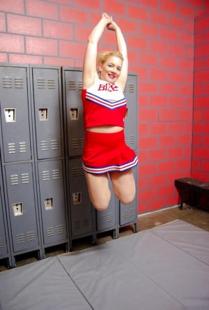 Barefoot blonde Heidi Mayne exposes upskirt panties in her cheerleader uniform