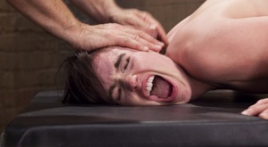 Jodi Taylor undergoes a slave training session while in bondage