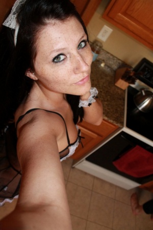 Horny teen Freckles in maid uniform  stockings showing nice ass in kitchen