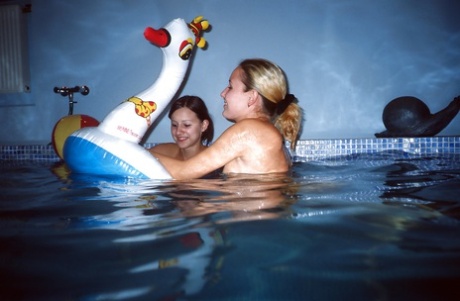 Sassy teenage cuties revealing their slippy curves by the pool
