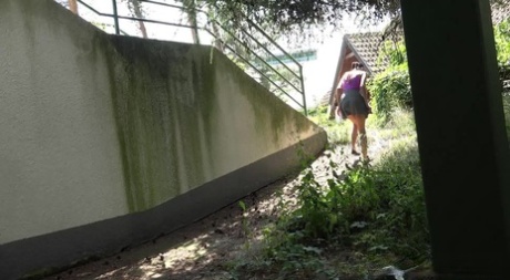 Dark haired girl Eveline Neill squats for a piss behind a building 39158050