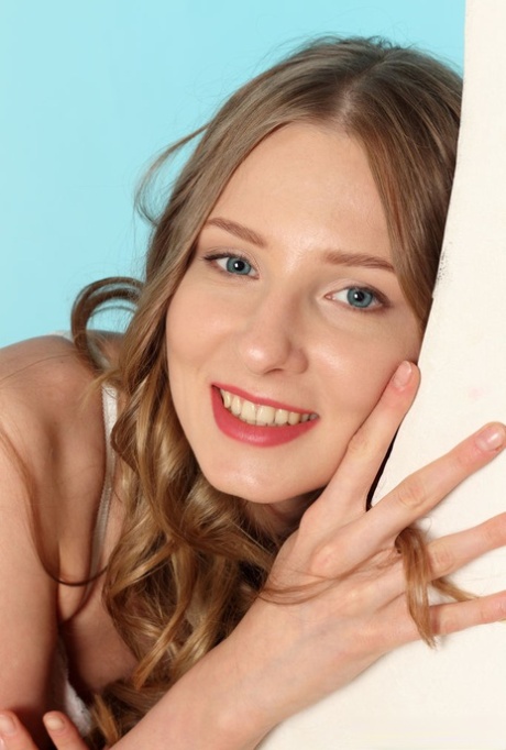 Beautiful 18 year old Nimfa discards white lingerie to go bare naked 69409895