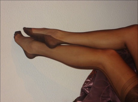 Older lady Nylon Jane models non nude in long gloves and a waist cincher 42466831