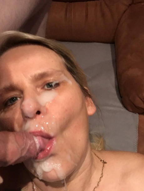 Blonde cougar gets cum in her eye after sucking off her stepson in tight pants 31207847