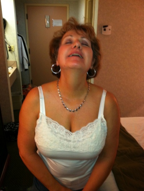 Older amateur Busty Bliss gives a blowjob before showing her cum covered belly 65183689