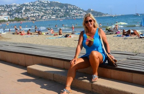 Thick older blonde Nude Chrissy fishes in the buff before taking a nude stroll 43068950