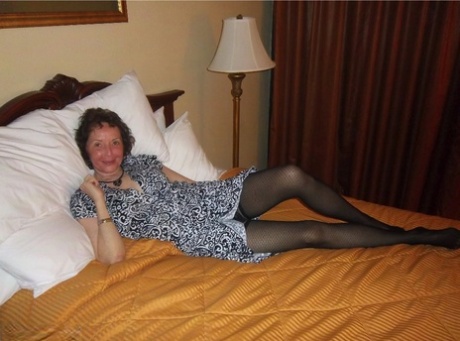 Curly haired mature woman likes sending her younger partner provocative photos 89642803