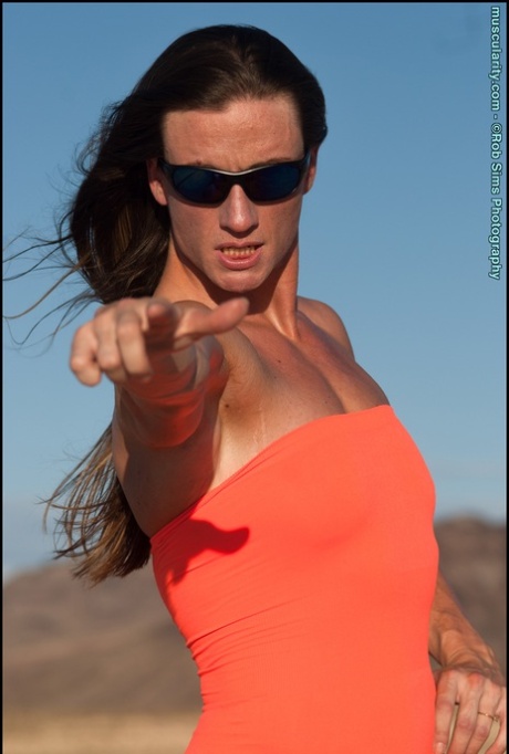 Brunette bodybuilder Carrie Rapp models by herself in an arid location 37018179