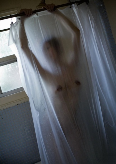 Japanese girl Emi Harukaze displays long nipples after taking a shower 78375063