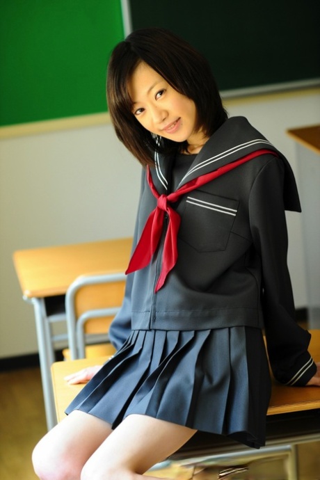 Barely legal Japanese student shows her bare knees in her school uniform 34110404