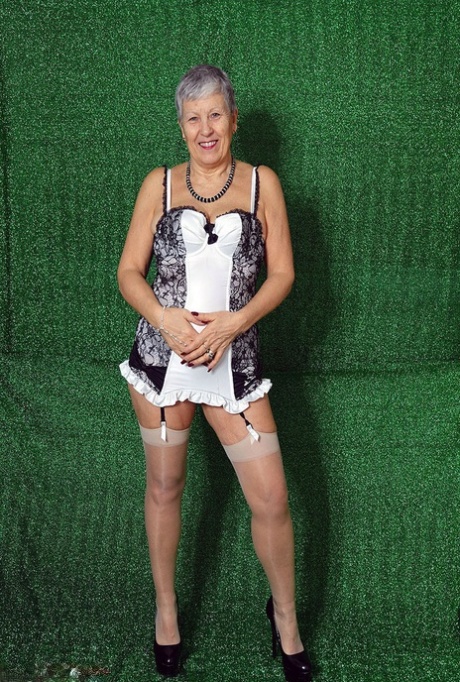Silver haired granny Savana models sexy lingerie in sheer nylons and heels 18499193