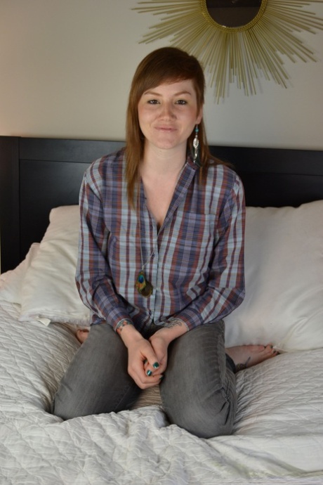 Redhead amateur with big naturals toys her pussy on top of her bed 91365627