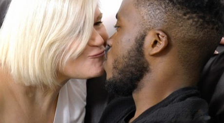 Mature blonde lady Lacey Starr has sex on a bed with her young black lover 58788489