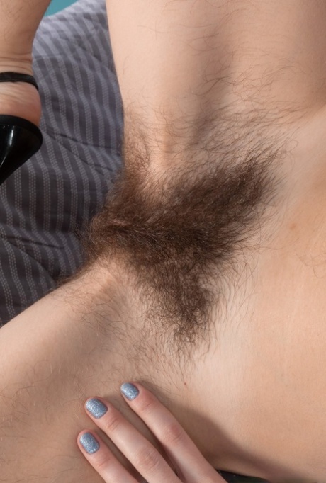 Amateur model Atisha stretches out her full bush after showing hairy underarms 54990603
