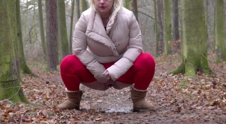 Overweight blonde Lilith takes a piss in the woods while wearing UGG boots 89318485