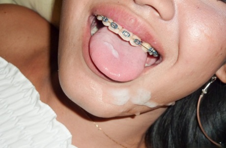 Thai girl Song takes a cumshot in her braces filled mouth after POV fucking 23358476