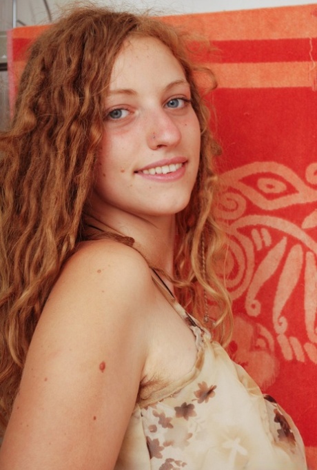 Hairy amateur with curly red hair exposes her clit in the bathroom 80412670