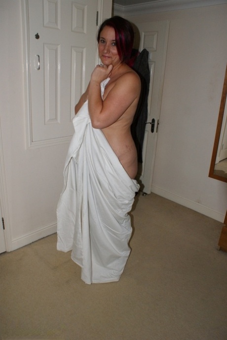Overweight redhead models completely naked while in her bedroom 91558482
