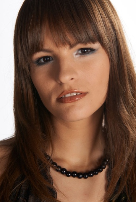 Young beauty Romanetta finger spreads her snatch in black heels 22262129