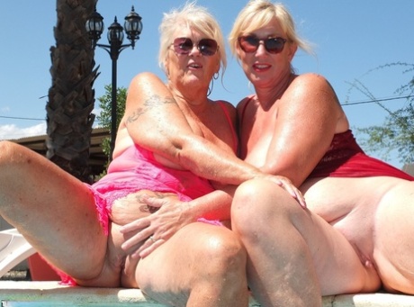 Mature blonde fatty Melody has lesbian sex in a swimming pool with her lover 10296835