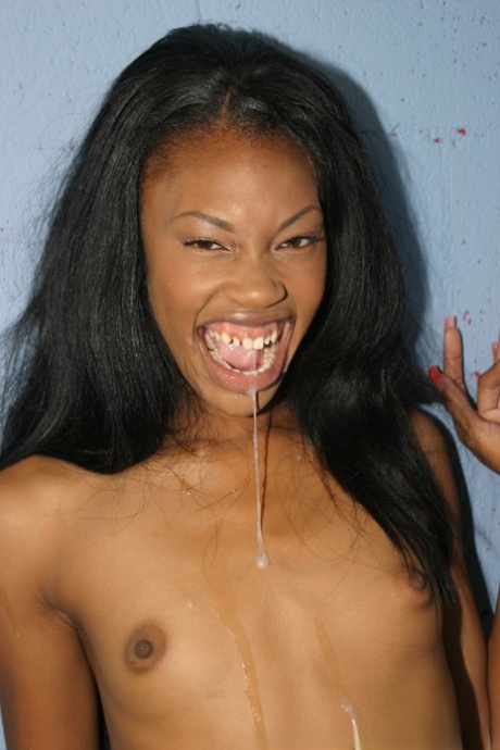 Black girl Andrina spits out a mouthful of cum after a gloryhole blowjob 33240798