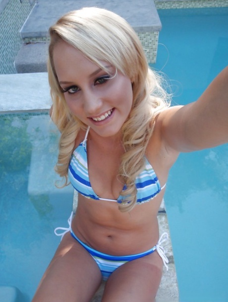 Relaxing by the pool amateur teen Liyla made some enticing photos 87200668