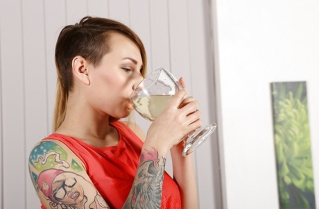 Tattooed blonde babe Catherine Sand uses suction tool for her nipples and cunt 11753916